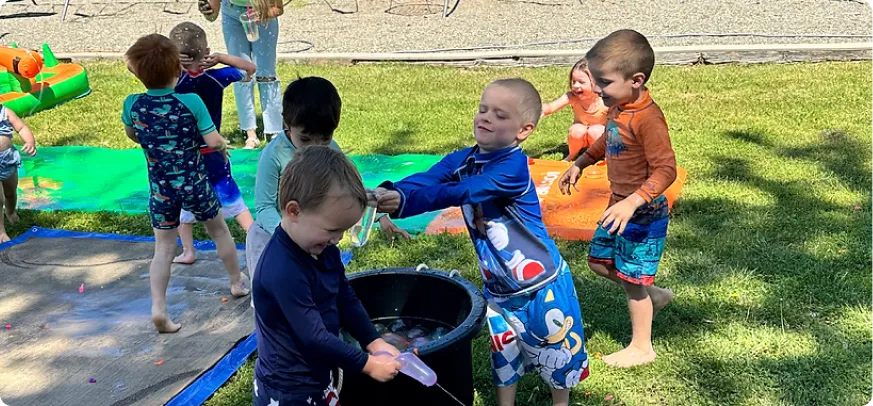 kids playing with water balloons